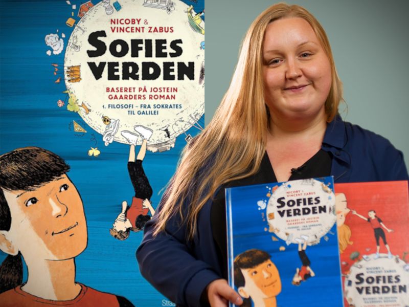 Bibliotekets litteraturformidler Julie holder tegneserierne "Sofies verden"